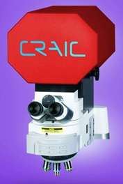Custom built microspot UV-vis-NIR and Raman spectroscopy of large samples